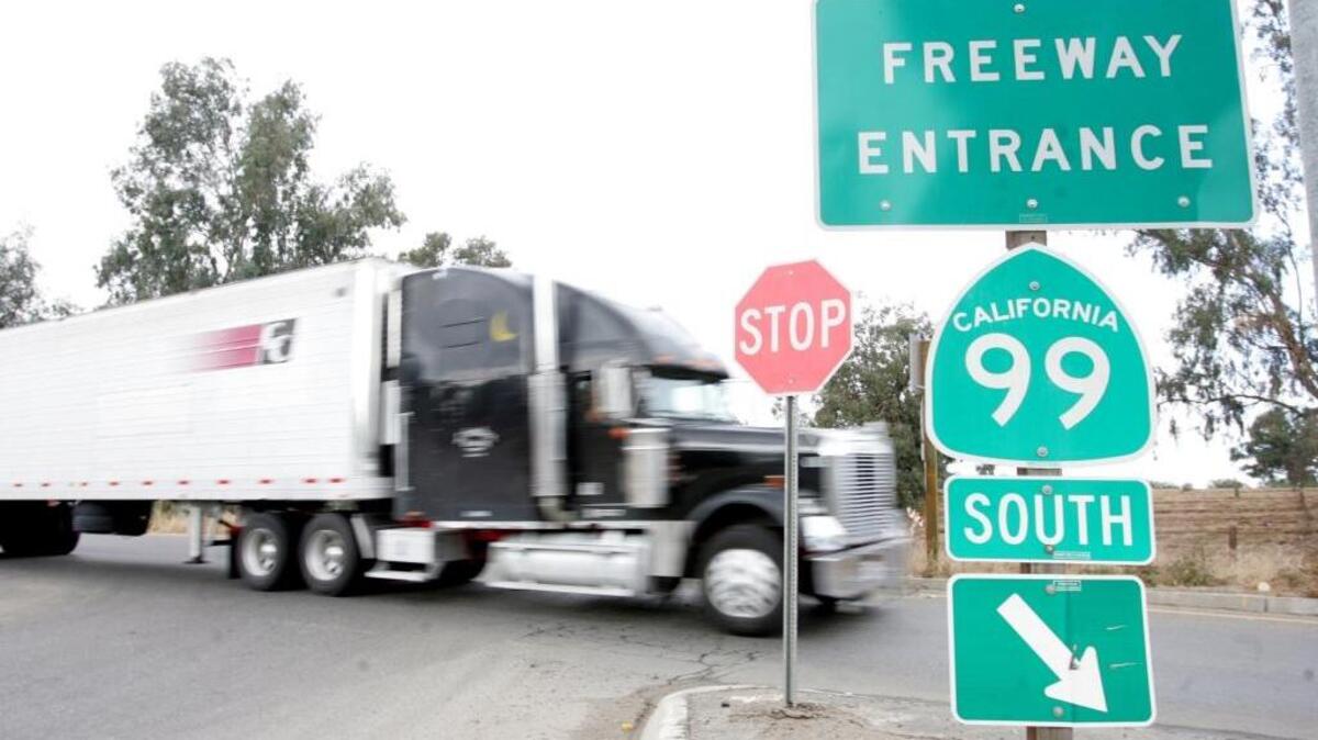 A big-rig truck enters Highway 99 in Fresno. Central Valley residents face disproportionate NOx exposure from freight corridors; the EPA must enforce manufacturers’ pollution commitments to protect public health. A big-rig truck enters Highway 99 in Fresno. Central Valley residents face disproportionate NOx exposure from freight corridors; the EPA must enforce manufacturers’ pollution commitments to protect public health.